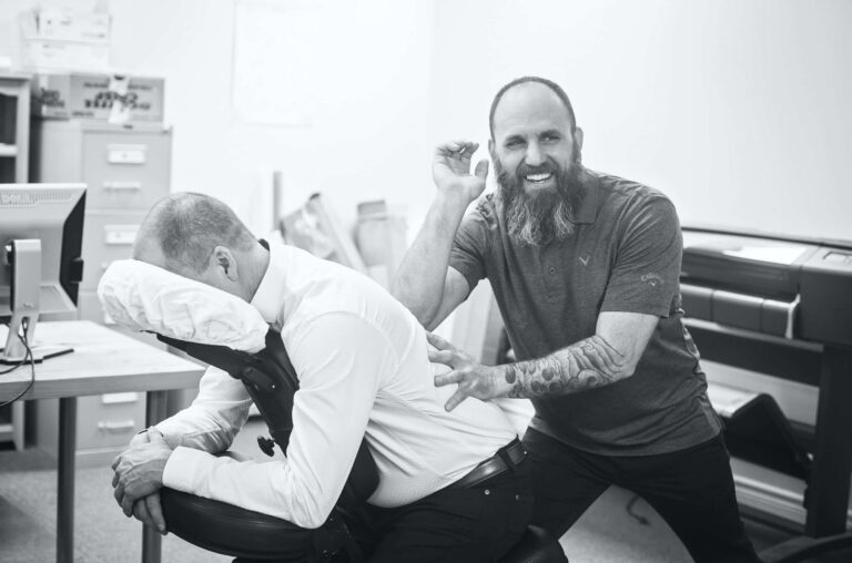 A man getting a massage at work