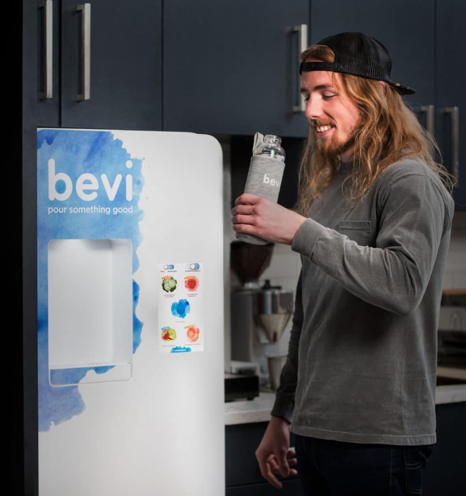 young student drinking bevi