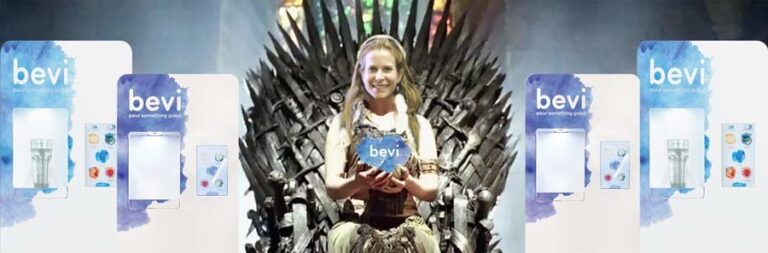 Eliza Becton, co-founder of Bevi photoshopped to look like a queen holding an award, surrounded by stand-up Bevi machines
