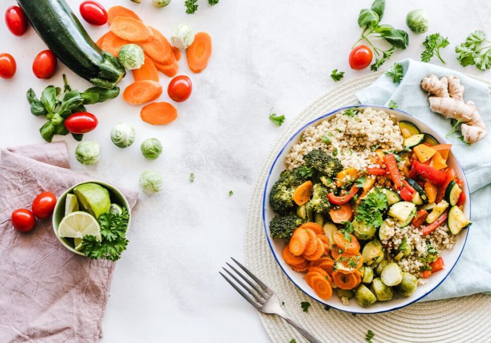 Bowl of fresh salad and vegetables with a fork