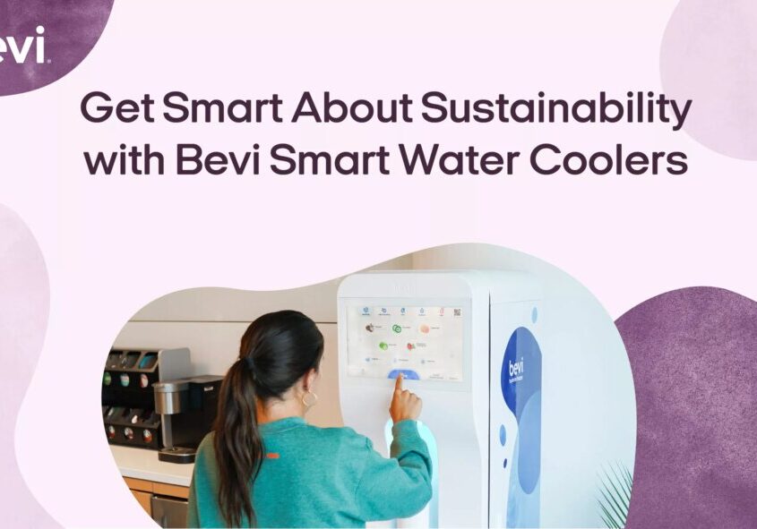 A girl standing in front of a Bevi Standup 2.0 water cooler