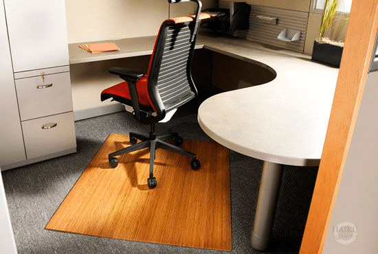 Office cubicle with bamboo chair mat